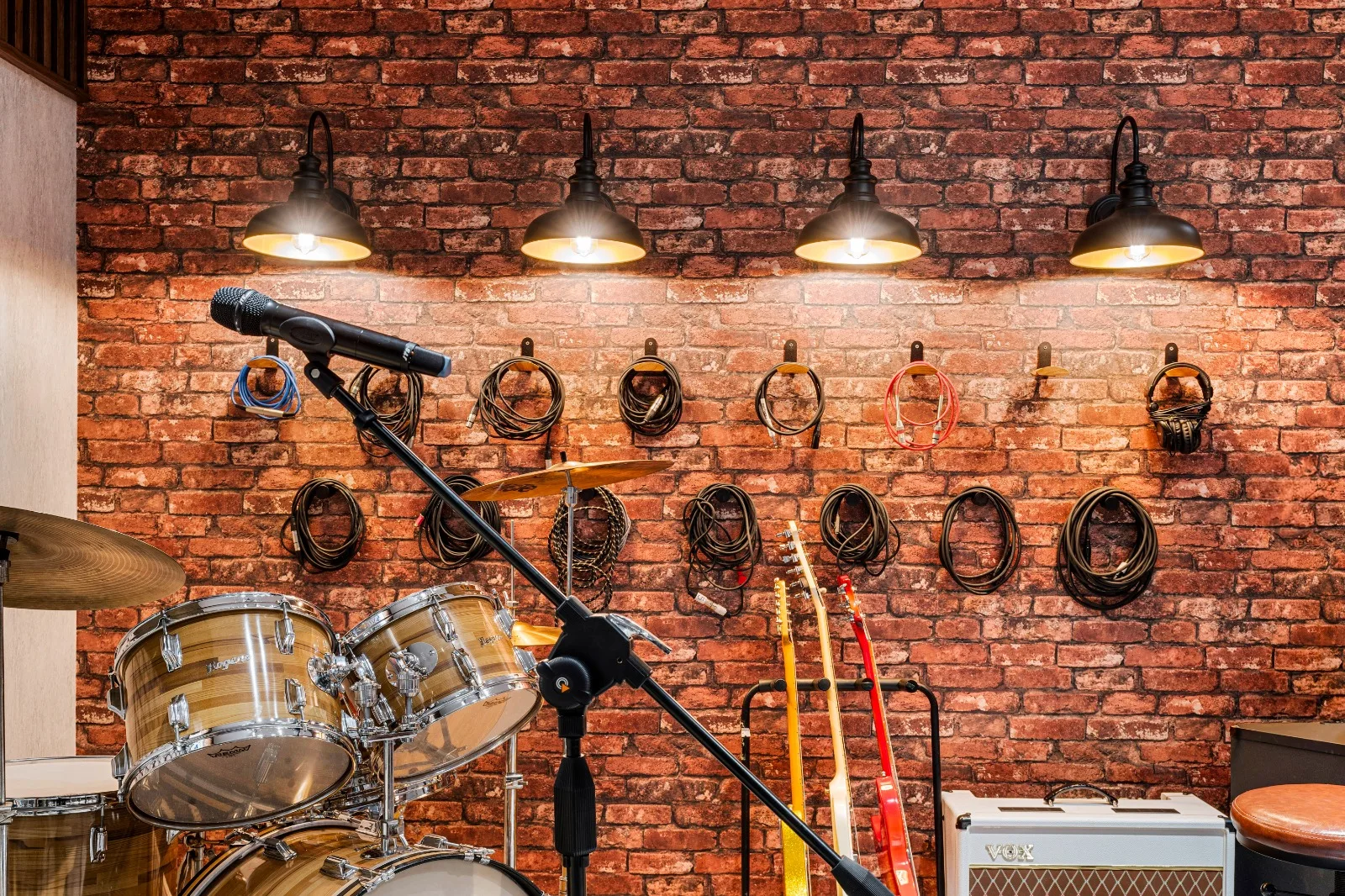 Drums, guitars and Vox amplifier in the studio